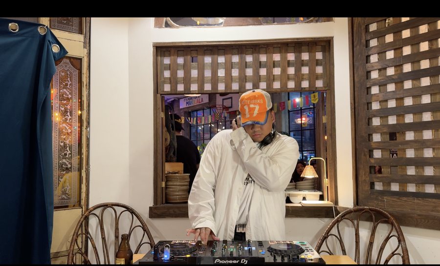 Fandemm playing a set at a restaurant